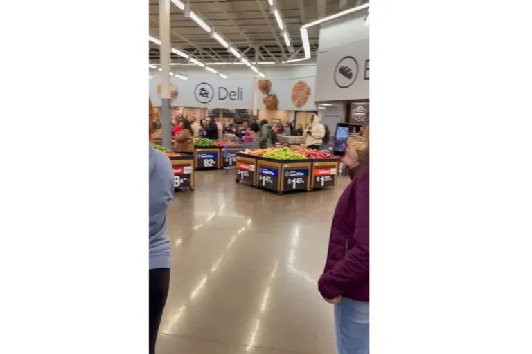 Random group of zealots worshiping in a Kansas City Walmart. Just let me buy my green onions and leave